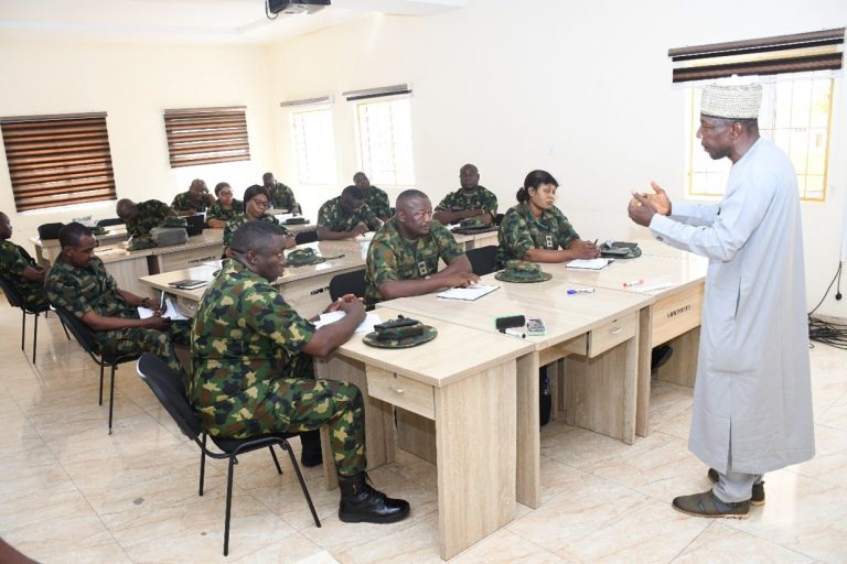The Founder and Executive Director IPC while addressing Participants comprising all three components of the Nigerian military formation. i.e. the Army, Navy and Airforce attending  a course during the visit.