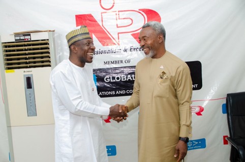 The Founder and Executive Director IPC, Dr. Suleiman A. Suleiman in a warm handshake with Dr. Ike Neliaku, President, Nigeria institute of Public Relations NIPR 