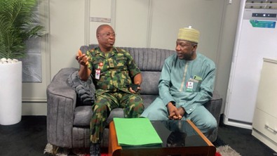 The Director, Department of Army Public Relations (DAPR), Major General Onyema Nwachukwu  having a chat with The Founder and Executive Director, Institute of Public Communication (IPC), Dr. Suleiman A. Suleiman 